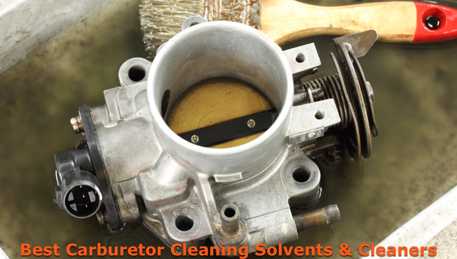 Cleaning carburetor in the bucket.