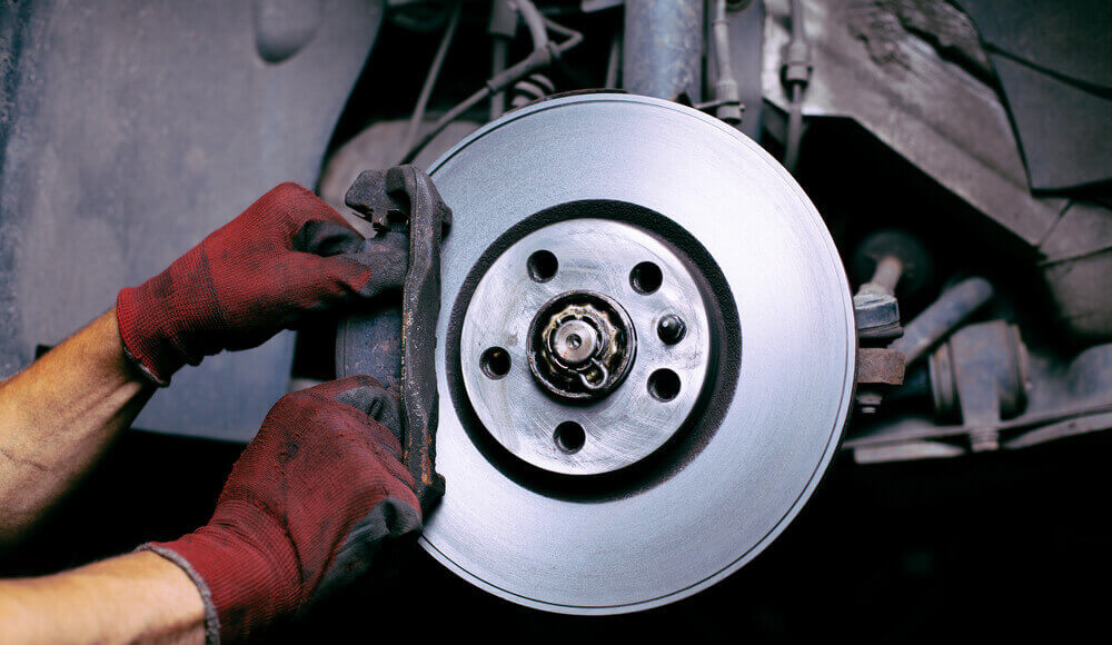 Car mechanic repair brake fade.