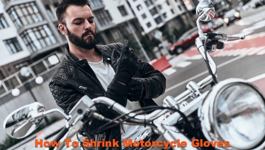 Motorcyclist adjusting his stretched leather gloves. 